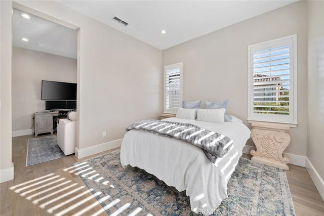 bedroom featuring light hardwood / wood-style floors