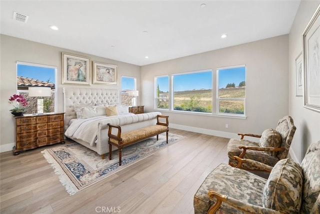 bedroom with light hardwood / wood-style floors