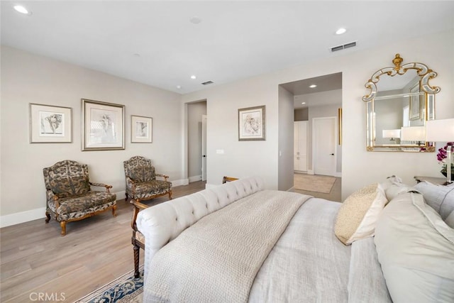 bedroom featuring light hardwood / wood-style floors