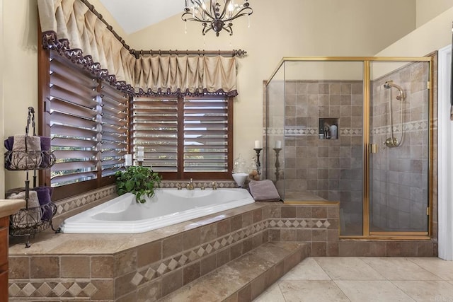 bathroom featuring tile patterned flooring, lofted ceiling, a chandelier, and shower with separate bathtub