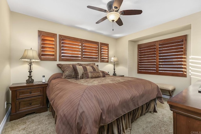 bedroom featuring a ceiling fan and carpet floors