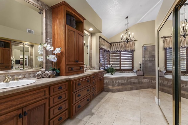 full bathroom with tile patterned flooring, visible vents, lofted ceiling, and a sink