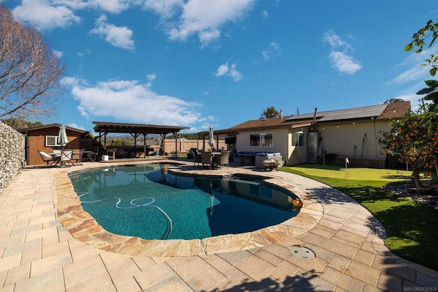 view of pool with a hot tub, a patio, and a gazebo