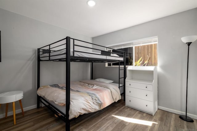 bedroom featuring dark hardwood / wood-style floors