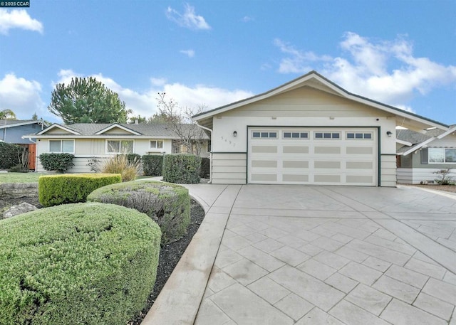 ranch-style house with a garage