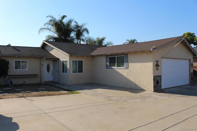 ranch-style home with a garage