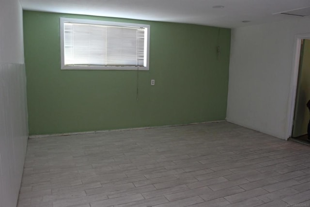 unfurnished room featuring light hardwood / wood-style flooring