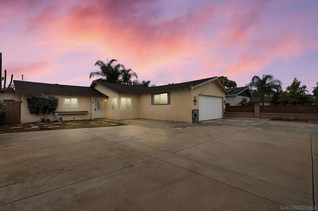 single story home featuring a garage