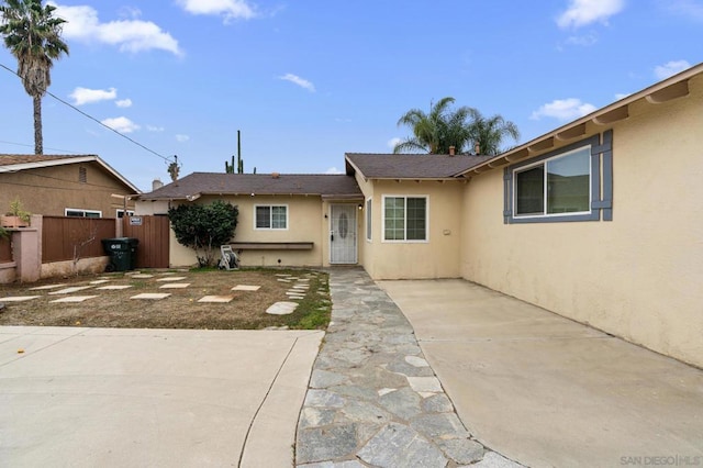 single story home featuring a patio