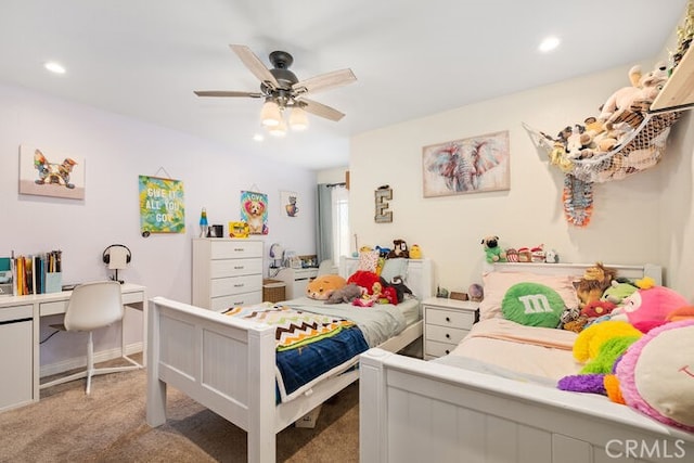 bedroom with light carpet and ceiling fan