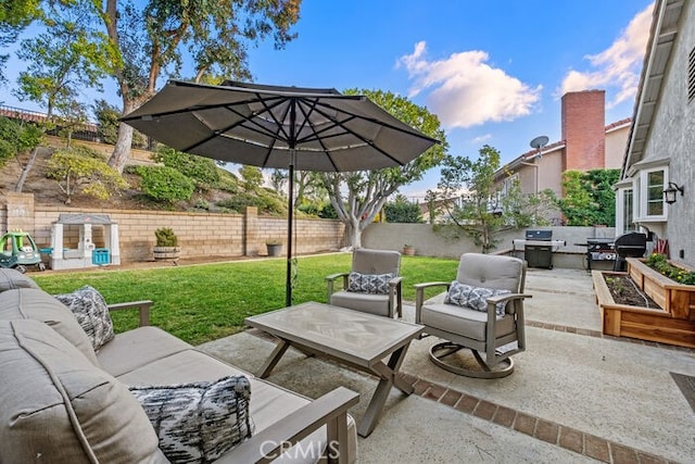 view of patio / terrace featuring a grill and an outdoor living space