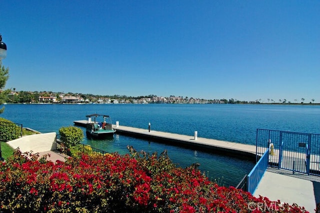 view of dock with a water view