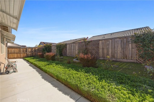 view of yard with a patio area