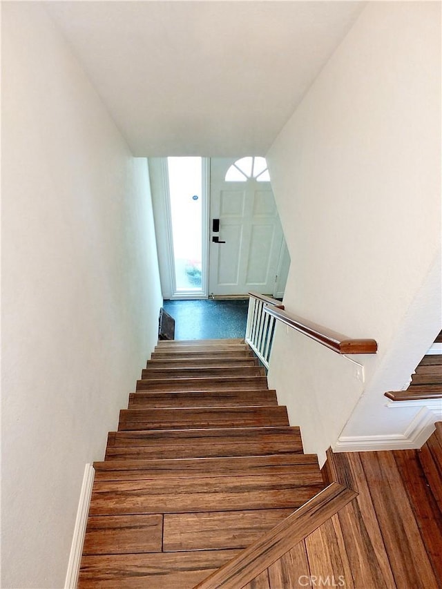 stairway with baseboards