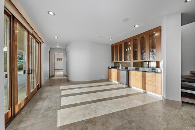 interior space with french doors and dishwasher