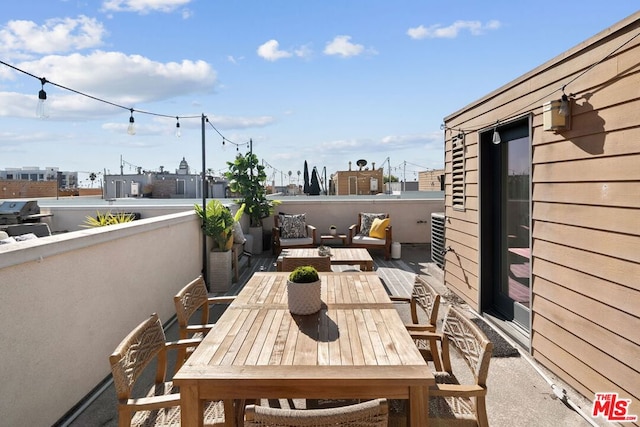 view of patio / terrace with a grill and an outdoor living space