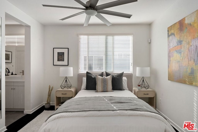 bedroom featuring ensuite bathroom and ceiling fan