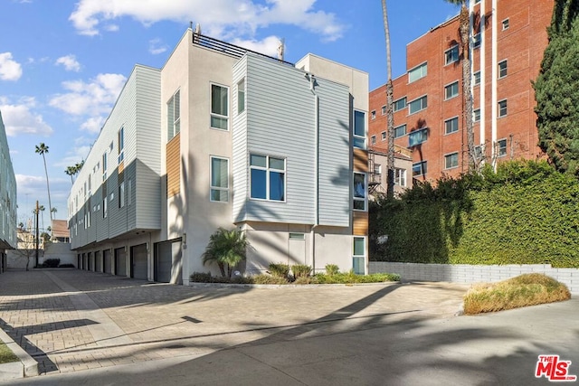 view of property featuring a garage