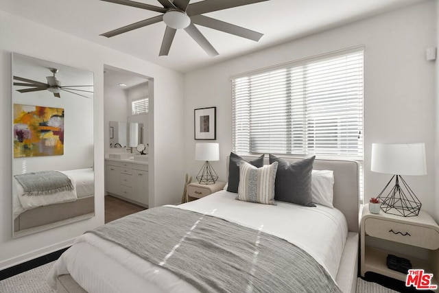 bedroom with ceiling fan and connected bathroom