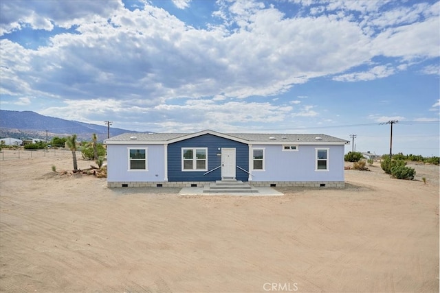 view of front of house with a mountain view