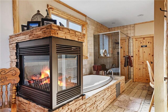 bathroom with tile patterned flooring and plus walk in shower