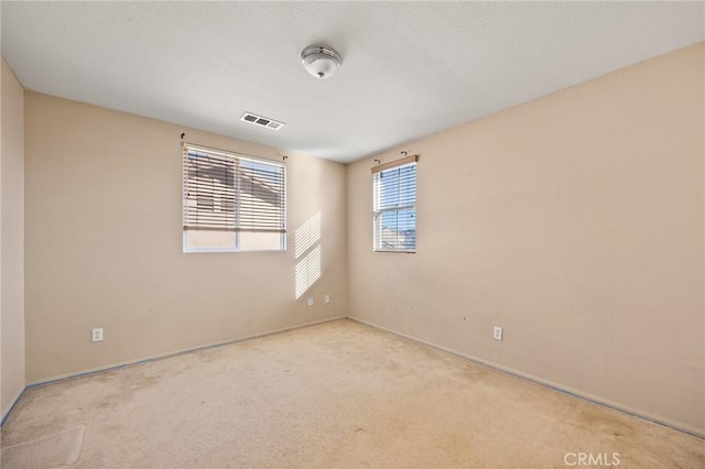 empty room with light carpet