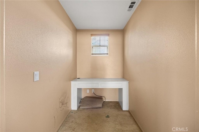 unfurnished office with light colored carpet