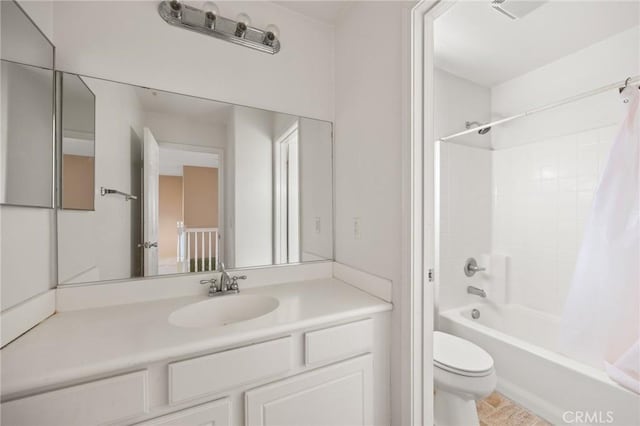 full bathroom featuring toilet, vanity, and shower / bath combination with curtain