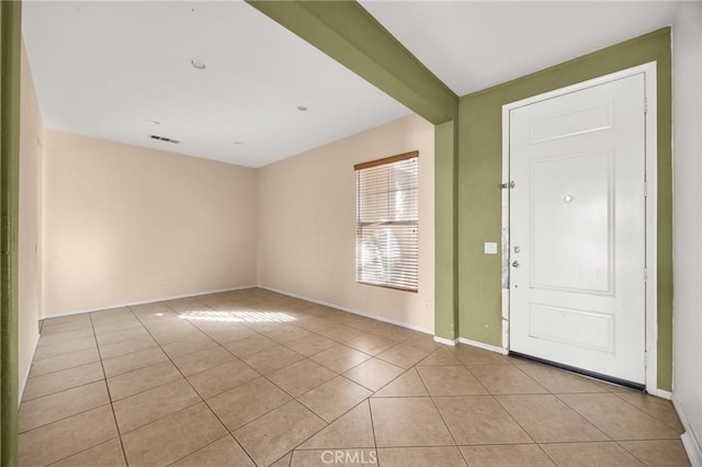 entryway featuring light tile patterned floors