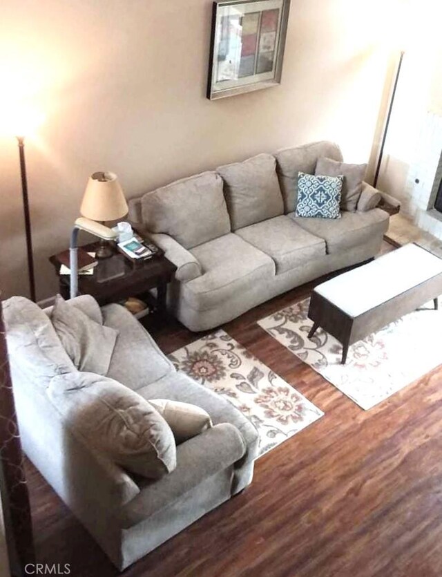 living room with dark wood-type flooring