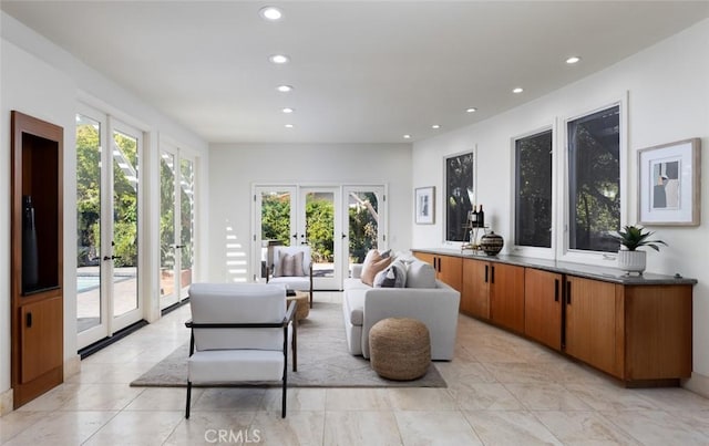 interior space with recessed lighting and french doors