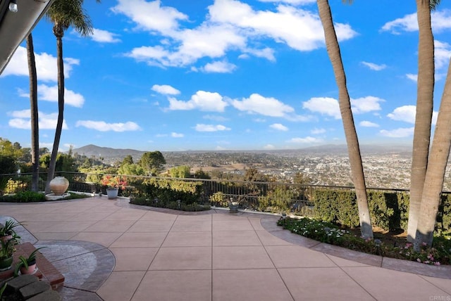 view of patio / terrace featuring a mountain view