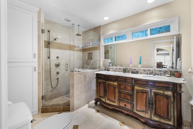 bathroom featuring walk in shower, tile patterned floors, vanity, and toilet