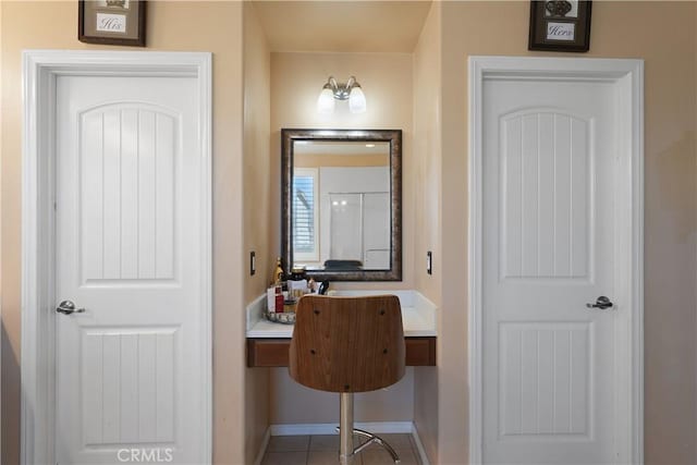 bathroom with tile patterned flooring