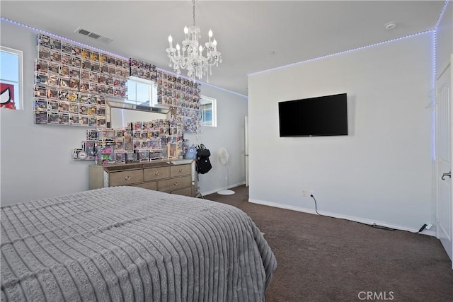 carpeted bedroom featuring an inviting chandelier and multiple windows