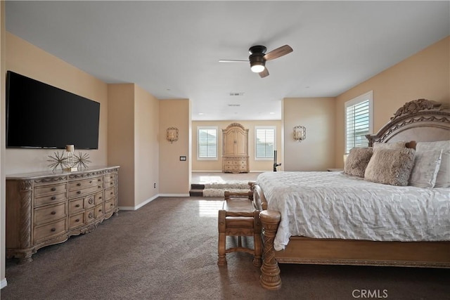 bedroom featuring ceiling fan and dark colored carpet