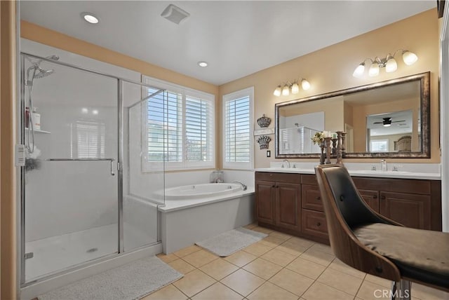 bathroom featuring ceiling fan, tile patterned floors, independent shower and bath, and vanity