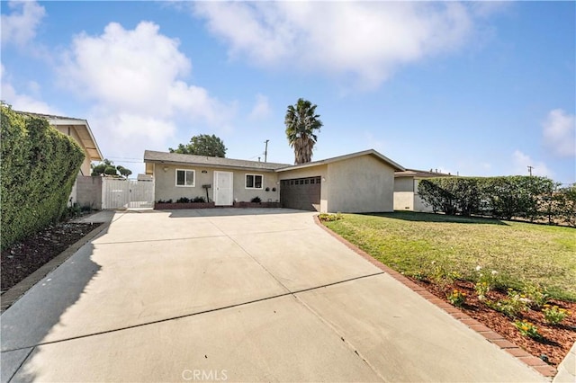 ranch-style house with a front yard and a garage