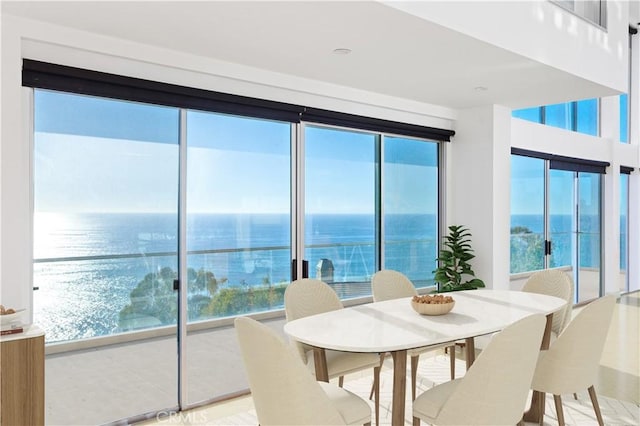 dining room with a water view