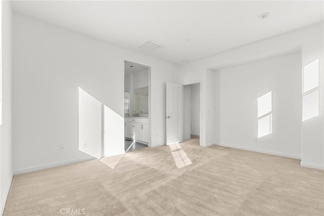 15992 Jamie Ln Unit 1, Fontana, CA 92336 - unfurnished bedroom featuring light carpet and ensuite bathroom