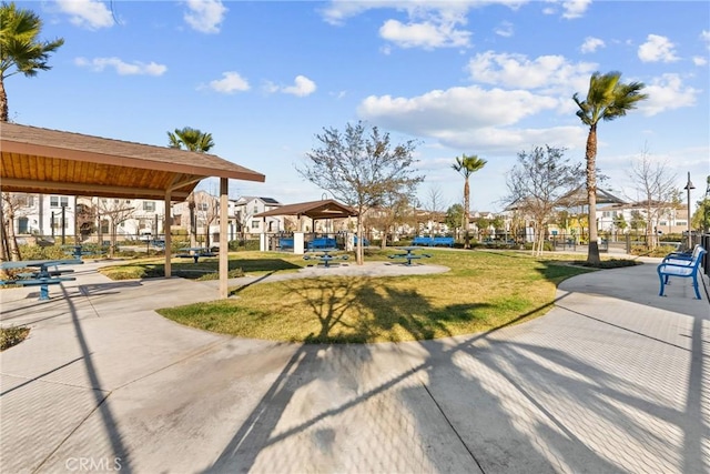 view of property's community featuring a yard and a gazebo