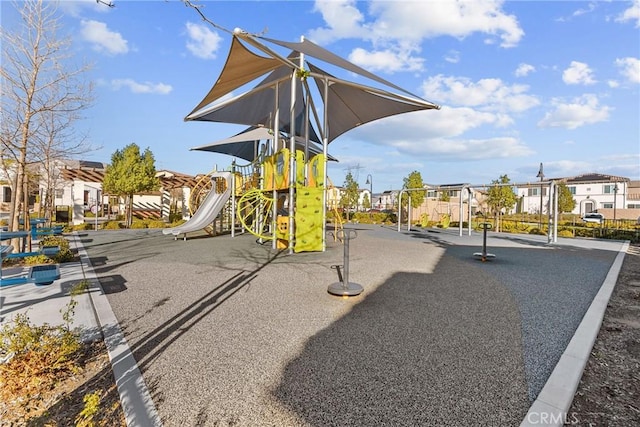 community play area with a residential view