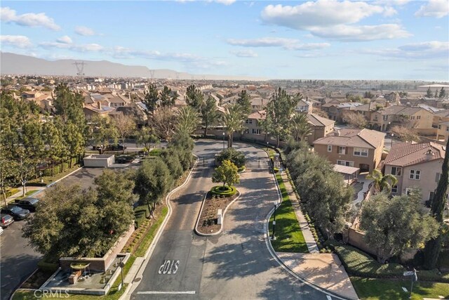 drone / aerial view with a mountain view and a residential view