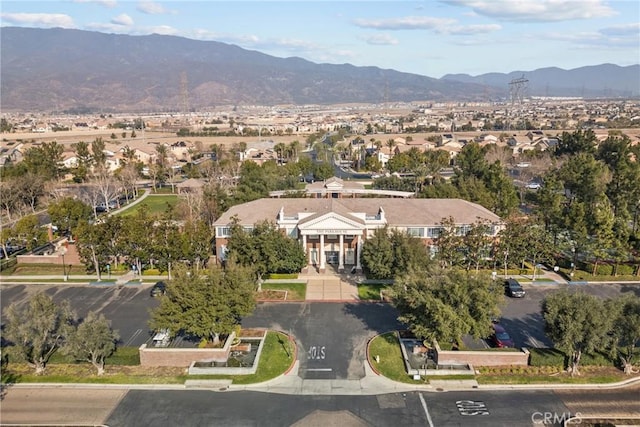 drone / aerial view featuring a mountain view