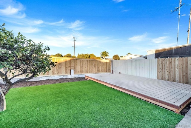 view of yard with a deck