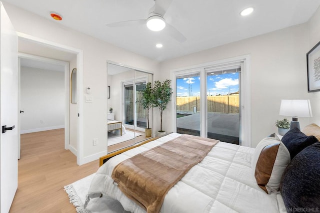 bedroom with ceiling fan, a closet, light hardwood / wood-style flooring, and access to exterior