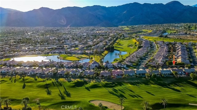 surrounding community featuring a water and mountain view