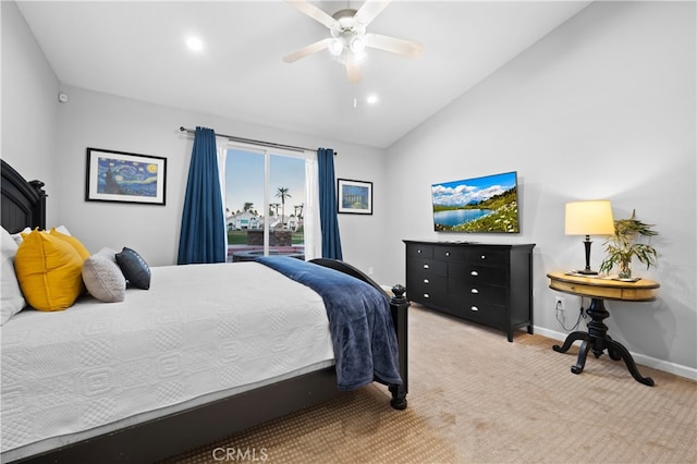 bedroom with lofted ceiling, light carpet, and ceiling fan