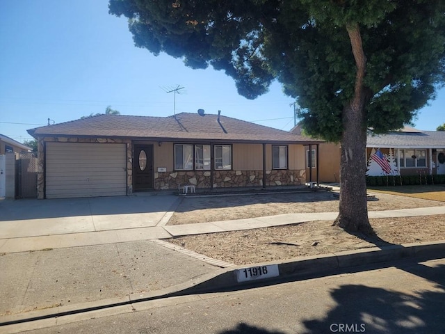 single story home with a garage