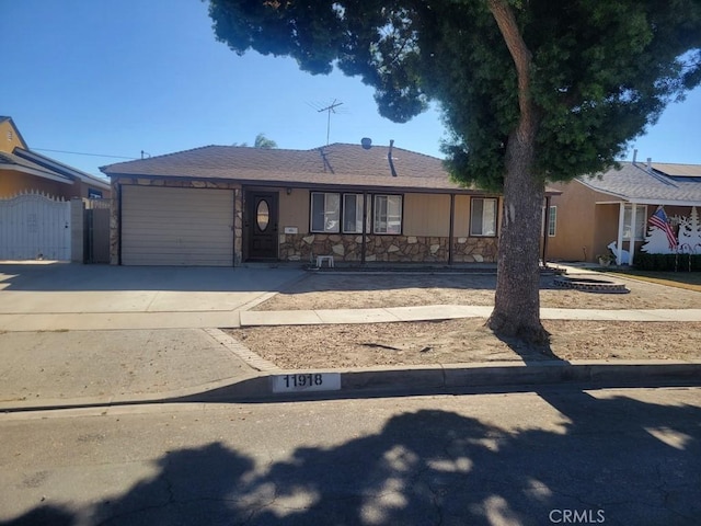 single story home featuring a garage